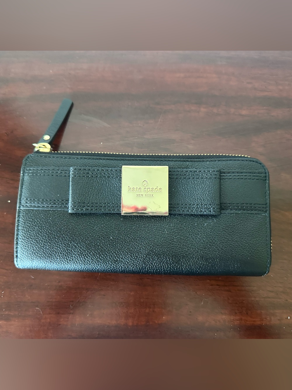 kate spade black leather zip wallet with gold plaque